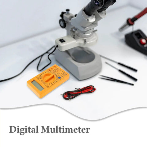 830D Digital Multimeter Tester With Buzzer 1999 Counts beside a microscope on lab table