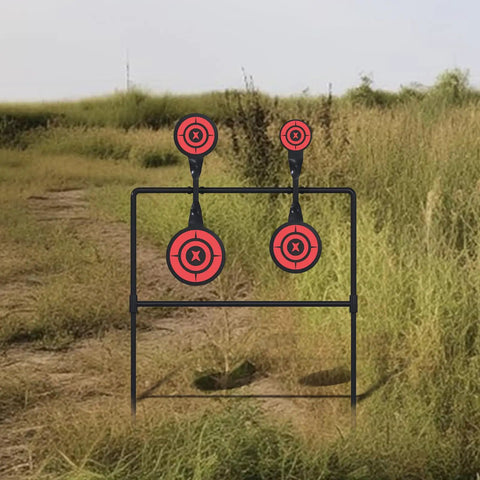 Auto Reset Steel Spinner Targets Set for outdoor shooting, 3/8 inch thick metal, four diameters, in a grassy field