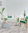 Living room with No Fuss Peel And Stick Wood Grain Vinyl Floor Tiles 12 By 12 Inch 48 Pack Waterproof Self Adhesive Flooring.