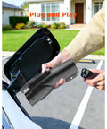Close-up of Built Tough Tesla To J1772 Charging Adapter With Secure Lock in hand, demonstrating easy connection for EV charging.