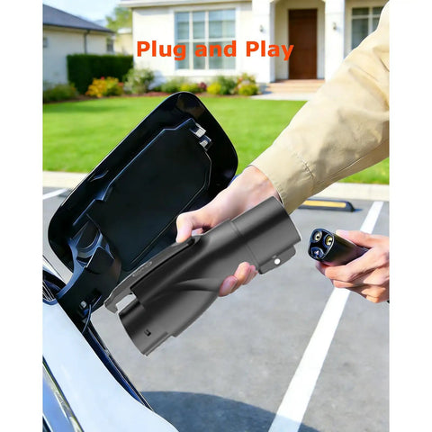 Close-up of Built Tough Tesla To J1772 Charging Adapter With Secure Lock in hand, demonstrating easy connection for EV charging.
