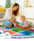 Woman and baby playing on Liquid Sensory Colorful Floor Tiles Pack Of 4 11.8 Inch Square Dance Floor Tiles That Move With Every Step