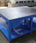 Industrial Heavy Duty Fitters Workbench With An Eight Mil Thick Solid A3 Steel Tabletop Built Like A Tank For Stubborn Mold Assembly and Serious Shop Grind, blue painted design, with drawer and spacious work area.