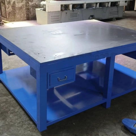 Industrial Heavy Duty Fitters Workbench With An Eight Mil Thick Solid A3 Steel Tabletop Built Like A Tank For Stubborn Mold Assembly and Serious Shop Grind, blue painted design, with drawer and spacious work area.