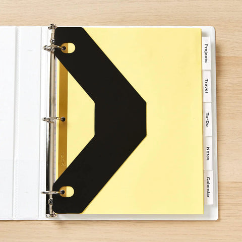 Triangle Shaped Sheet Lifters For 3 Ring Binders, Black, Pack Of 2, showing insertion in binder with tabs visible