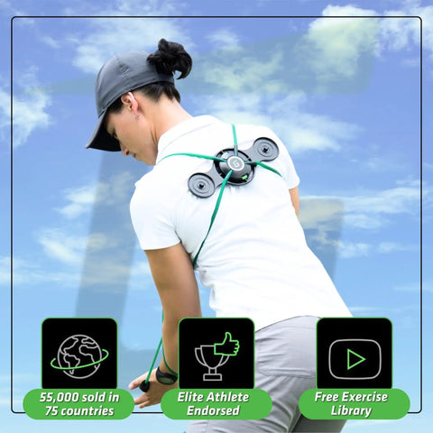 Golfer using TPro Green 2.0 Golf Swing Training Aid with straps and discs for strength and stability during swing practice.