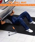 Man working under car on oil spill mat for driveway and garage floor 36x60 heavy duty protector with anti leak backing