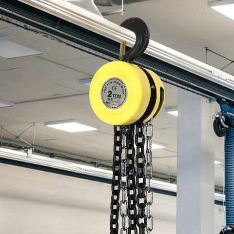 4400 Lb Capacity Chain Hoist With 2 Ton Manual Hand Chain Block hanging in workshop, G80 chain, alloy steel, 360 degree hook, yellow
