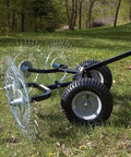 Acreage Lawn Rake with Four Tine Steel Tow Behind Dethatcher for Lawn and Garden Cleanup, 48 inch, on grassy area