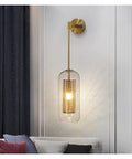 Lowkey Chill Modern Wall Sconces With Smooth Glass Shades And Glare Free LEDs That Really Bring Premium Vibes To Living Rooms And Bedrooms For Total Home Glow Up, gold metal wall sconce with clear glass shade.