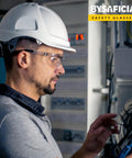Person wearing 12 Pack Clear Safety Glasses Bulk With Kickass Scratch Resistant Polycarbonate Lenses And Sweet Uv Protection For Heavy Duty Job Sites And Weekend Diy Projects Rock Solid Ansi Z87 Approved while using a tablet.