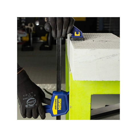 One-Handed Quick-Change Bar Clamp for Medium-Duty Projects, 12 Inch, 300 Lbs Clamping Pressure in use on a workbench.