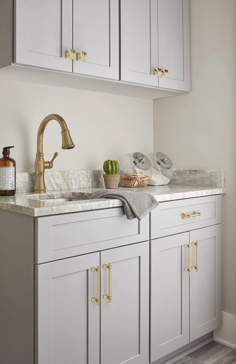 Davenport Champagne Bronze Cabinet Pull Six and a Half Inch Overall Length Five and One Sixteenth Inch Center to Center on gray cabinets