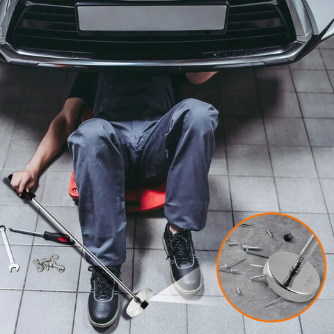 Mechanic using 35 Lb Magnetic Pickup Tool Telescoping Wand With Upgraded Pole for nails, screws under car