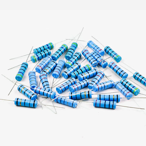 Image of scattered blue metal film resistors from 5W Metal Film Resistor Assorted Kit 100 Pieces 50 Resistor Values From 1 Ohm To 1 Megaohm 1 Percent Tolerance Durable Box For Electronics Projects And DIY Repairs