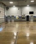 Polished concrete floor treated with Real Deal Floor Sealer And Epoxy Topcoat That Refreshes And Beautifies Polished Concrete With A Knockout Flake Coating Built For Gritty Warehouse Jobs One Gallon Jug.