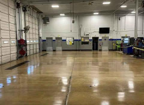 Polished concrete floor treated with Real Deal Floor Sealer And Epoxy Topcoat That Refreshes And Beautifies Polished Concrete With A Knockout Flake Coating Built For Gritty Warehouse Jobs One Gallon Jug.