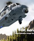 Military Style RC Helicopter With 8K Camera And Built In Screen Remote flying outdoors with mountains in background