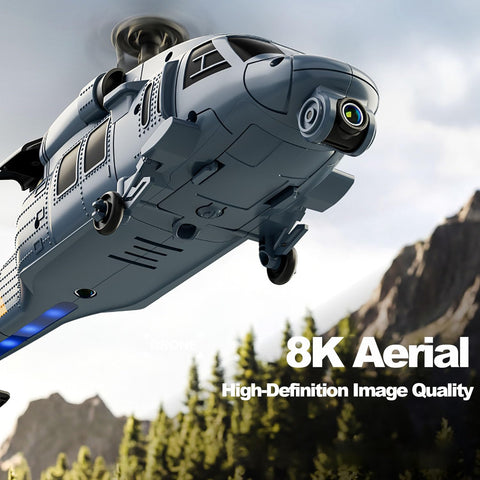 Military Style RC Helicopter With 8K Camera And Built In Screen Remote flying outdoors with mountains in background