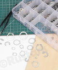 304 Stainless Steel E Clip And C Clip Retaining Rings Kit With Tweezers, 303 Pcs Assortment, 21 Sizes From M1.5 To M28 displayed on table