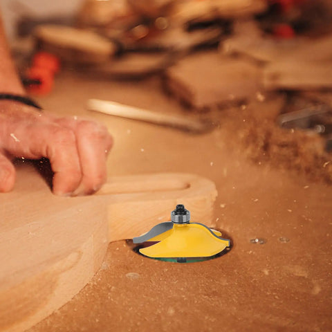 Woodworker using Three Piece One Quarter Inch Shank Round Over Cove Router Bit Set for furniture making.