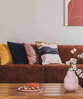 Living room with a 7 Day Programmable Thermostat With Backlit Digital Display And Precise Temperature Control To Within 1 Degree Fahrenheit on the wall.