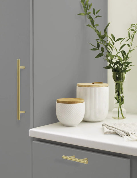 7 Inch Center To Center Golden Champagne Cabinet Pulls Set Of 10, Nine And Three Eighths Inch Overall Length, visible on cabinet