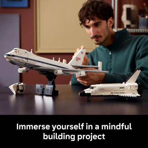 Man showcasing Shuttle Carrier Aircraft Building Set For Adults Ages 18 Plus Dope Boeing 747 And NASA Space Shuttle Enterprise Build