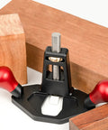Tough As Nails Handheld Router Plane Featuring Adjustable Stainless Steel And Ebony Blades built like a tank, shown with wood blocks.