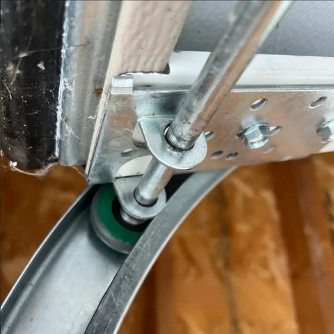 Heavy Duty Garage Door Track Lift Bracket Built To Last For 2 Inch Track Fits 7/16 Inch Stem Rollers Durable And Easy To Install Bottom Bracket Replacement For Reliable Smooth Operation close-up image