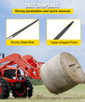 Tractor with Beefed Up 39 Inch Hay Bale Spear With 3600 Pound Capacity lifting hay bale, showing sturdy steel rod and tapered point
