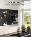 Ultra Top Notch Articulating Pegboard Mount For Laptops And Computer Screens Featuring Ventilated Trays, mounted in home office.