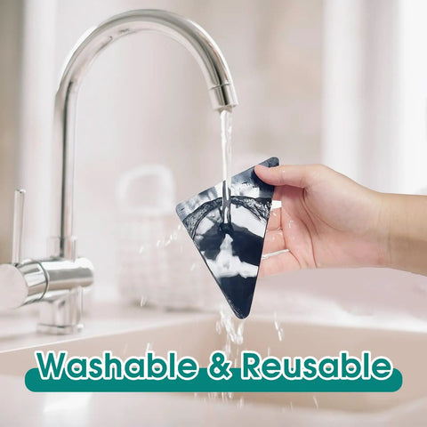 Triangular pad from 12 Plus 2 Pcs Rug Gripper Set With Double Sided Rug Pads For Hardwood Floors being washed under a tap.