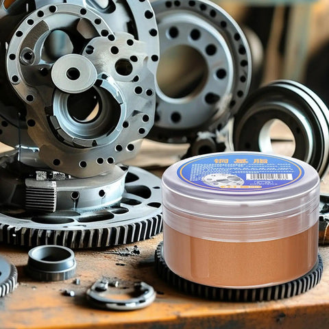 Copper Grease High Temperature Assembly Lubricant Pro Grade Heavy Duty tub in front of metal gears for industrial use