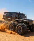 Amphibious One Twelfth Scale 8WD Remote Control Monster Truck For Land And Water Waterproof All Terrain RC Toy, in action on sand