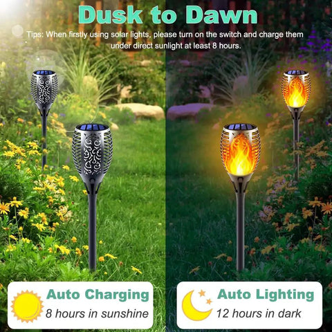 Solar Torch Lights With Flickering Flame Realistic Fire Effect For Outdoor Garden And Patio Easy Setup No Fuss Auto On Off Dust To Dawn Waterproof Landscape Decoration Solar Powered Security Torch Light Pack Of Four in garden setting