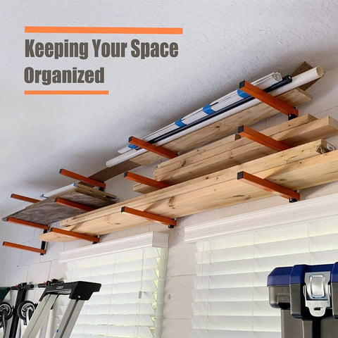 Beefy Heavy Duty Lumber Storage Wall Rack Set With 3 Level Wood Organizer Mount in garage, holding lumber above windows