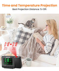 Digital Projection Alarm Clock With Weather Station And Indoor Outdoor Thermometer For Bedrooms USB Charger AC Or Battery Powered Bedroom Friendly All In One Time And Temperature Projection displaying time and temperature on a wall in a living room setting.