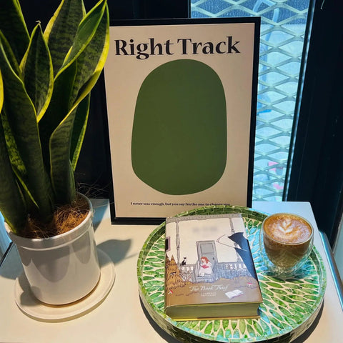 Next Level 12.5 Inch Wooden Lazy Susan With Mother Of Pearl Inlay, Super Heavy Duty Spinning Turntable Serving Tray For Kitchen Islands Or Cookouts, Straight Up A Showstopper with coffee and book on vibrant tray.