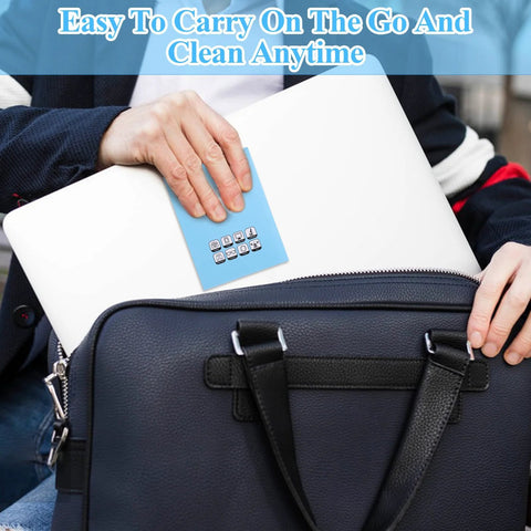 Front view of a blue lens-cleaning tissue packet being placed into a black leather bag.