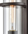 Close-up of Holbrook One Light Sconce In Oil Rubbed Bronze With Clear Blown Glass Transitional Wall Fixture, bulb detail