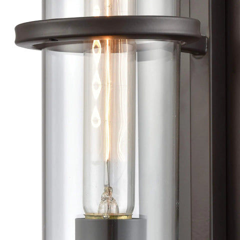 Close-up of Holbrook One Light Sconce In Oil Rubbed Bronze With Clear Blown Glass Transitional Wall Fixture, bulb detail