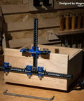 Professional Cabinet Hardware Jig With Micro Adjustment Slider And Drill Bit Storage For Nailing Drawer Pull Placement Right On The Money in use on a wooden drawer.