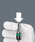 Close-up of a hand gripping a bit from the Kraftform Kompakt 400 RA Imperial Set 1 T Handle Bit Holder With Ratchet Function And Bit Set 17 Pieces.