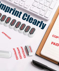 Solid Workhorse Eight In One Self Inking Office Stamp Set For Paid Copy Void Scanned Entered Original Approved Confidential Documents Quick Handling Easy Storage And Smooth Daily Desk Operations In Bright Red Ink with various stamps on a desk.