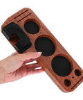 Sturdy Wooden Espresso Tamper Station Featuring Slick Portafilter Holder And Compact Coffee Organizer To Keep Your Kitchen Counter Looking Fresh And Totally Built For The Morning Rush, held in hand, showing light brown wood and black accents.