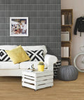 Living room with 3D Matte Green Peel And Stick Tiles Pack Of Ten Eleven Point Eight Inch Square PVC Backsplash Tiles on wall.