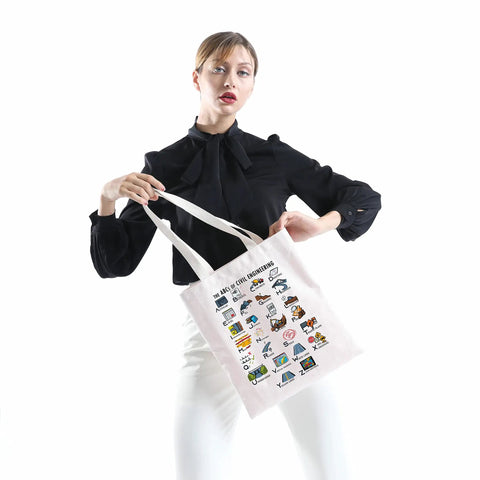 Model holding Civil Engineer Alphabet Tote Bag The ABCs Of Civil Engineering Gift For Female Engineers Graduation Present Durable Canvas Tote