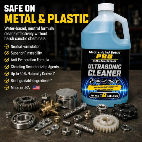 Badass Ultrasonic Cleaner And Degreaser Concentrate kit with 128 oz bottle and metal parts on a table.