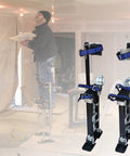Adjustable Drywall Stilts 15 To 23 Inches For Sheetrock, Painting, and Cleaning, 225 Lb Capacity, Lightweight Aluminum displayed in use.